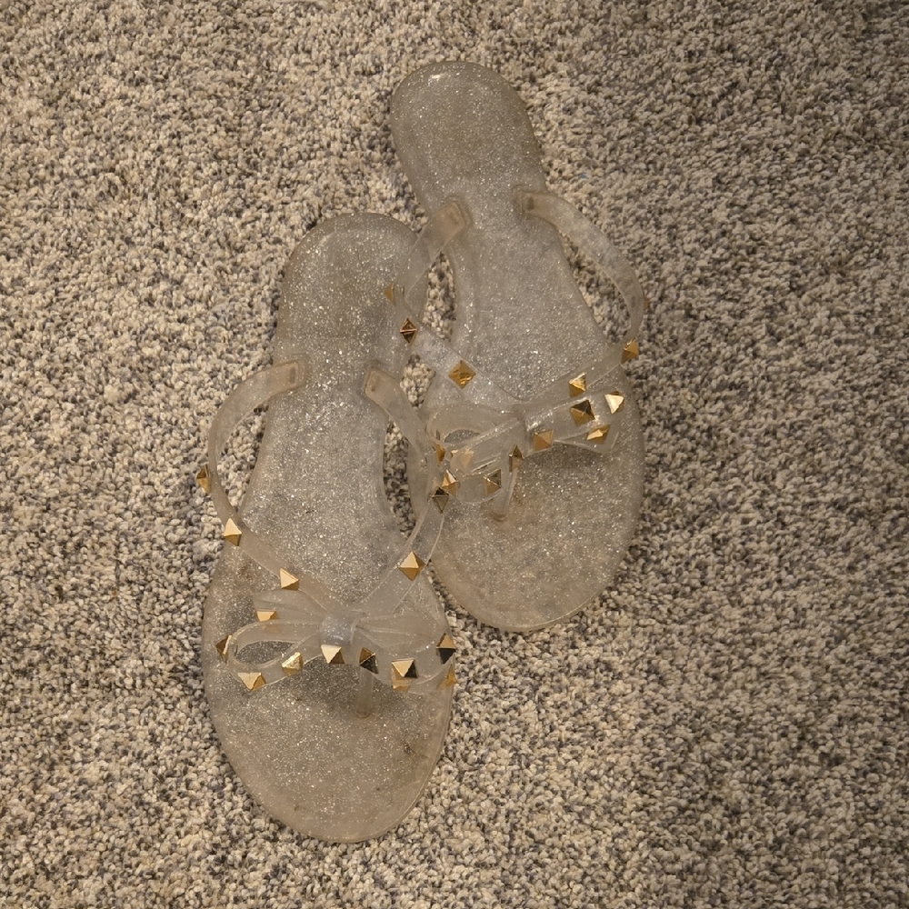 Stylish Clear Sandals with Gold Accents